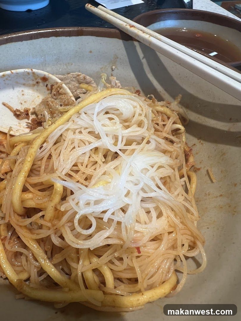 Noodle Dish with Chopsticks
