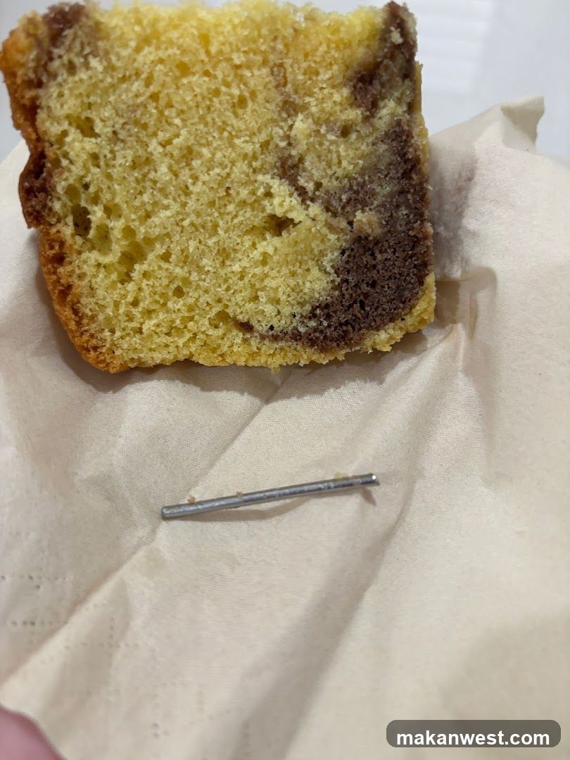 Marble cake with a metal object
