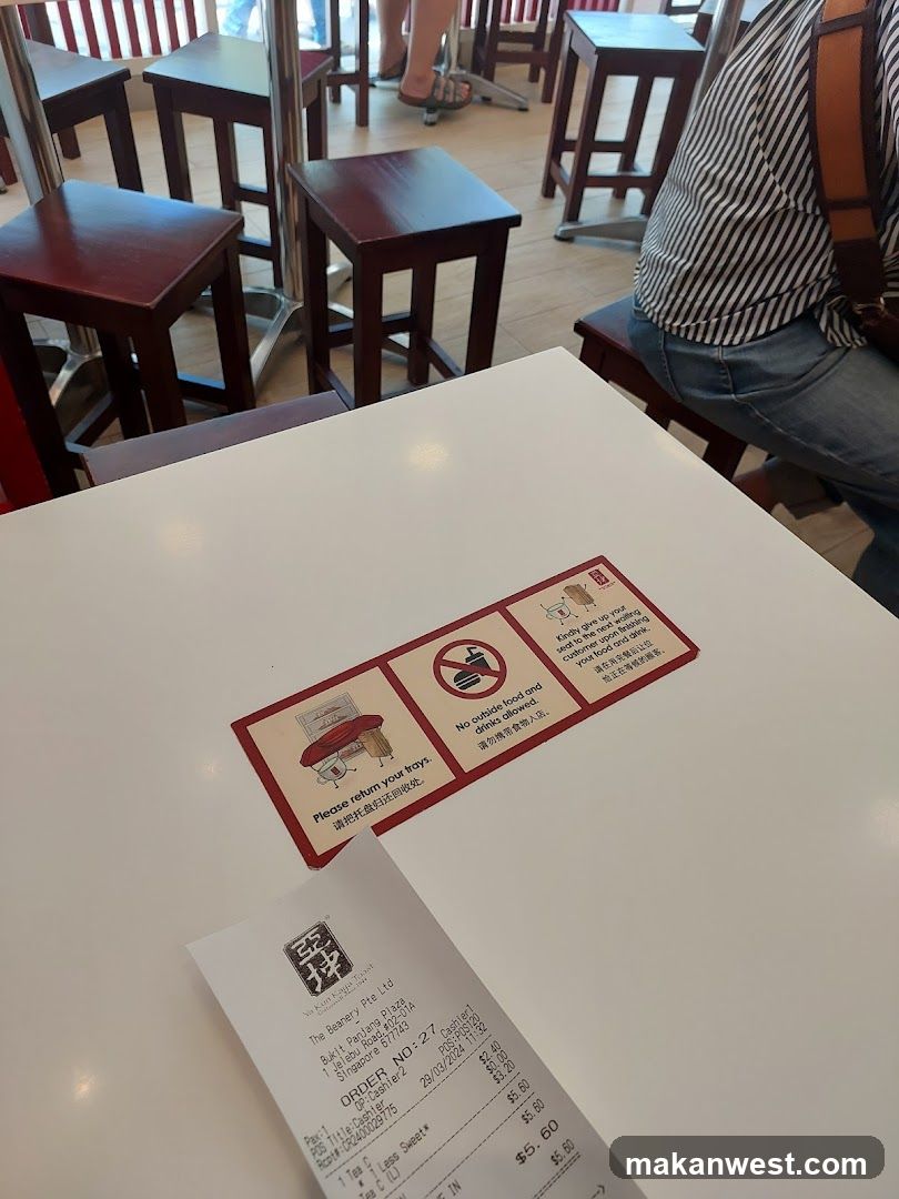 Restaurant Table with Receipt and Signs