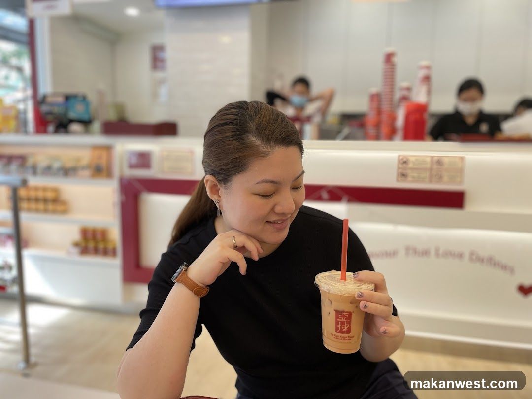 Woman holding a drink