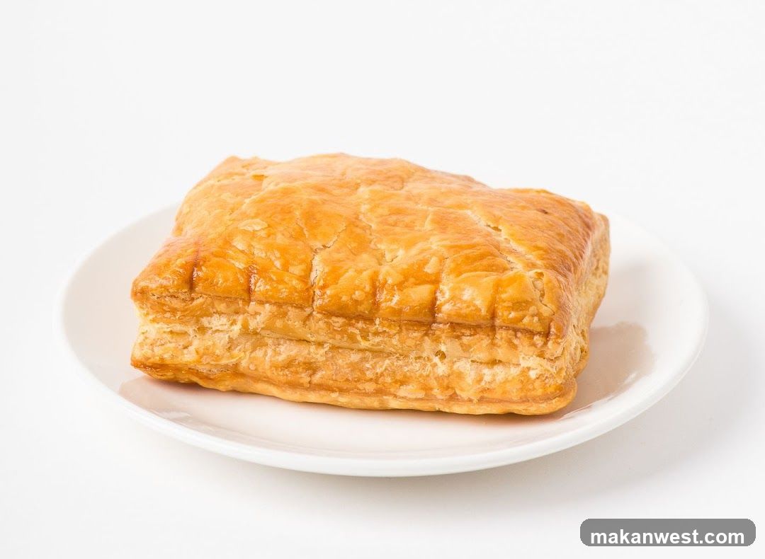 Golden Puff Pastry on a White Plate