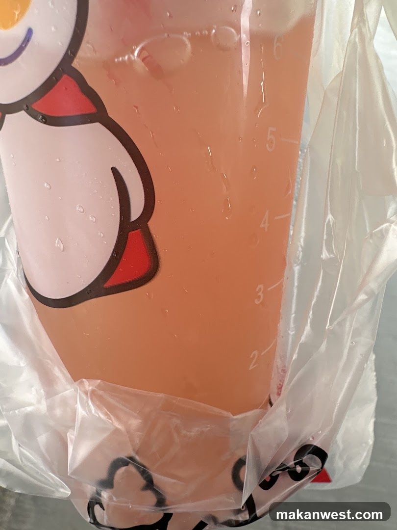 Beverage in a cup with a snowman design