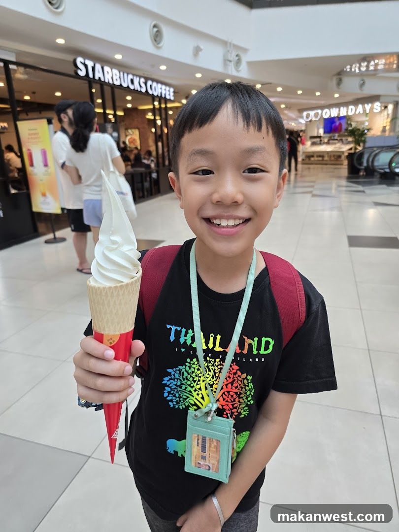 Boy with Ice Cream in Mall