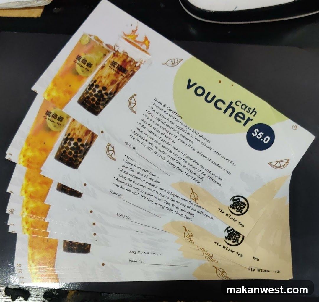A stack of cash vouchers for "The Whale Tea" offering a $5.0 discount. The vouchers have terms and conditions listed, including applicability to specific outlets and conditions for product value differences.