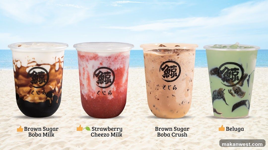 Four Bubble Tea Drinks on a Beach