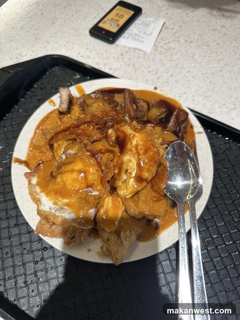 Plate of Food with Fried Egg and Sauce