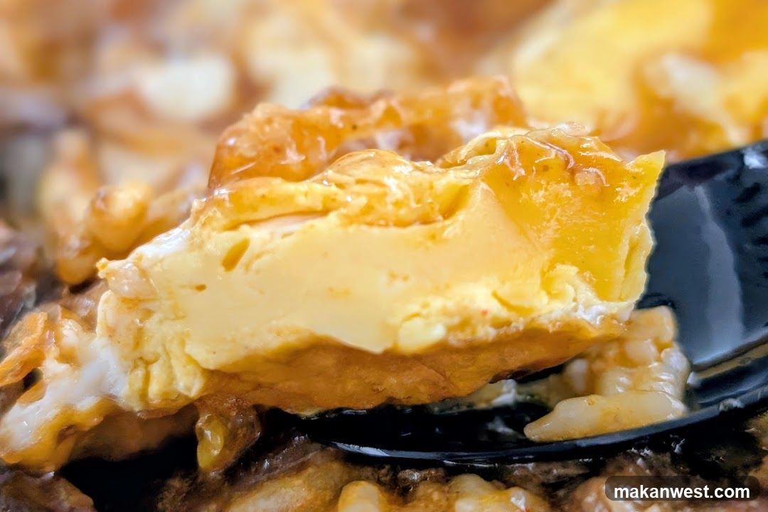 Close-up of a dish with egg and sauce
