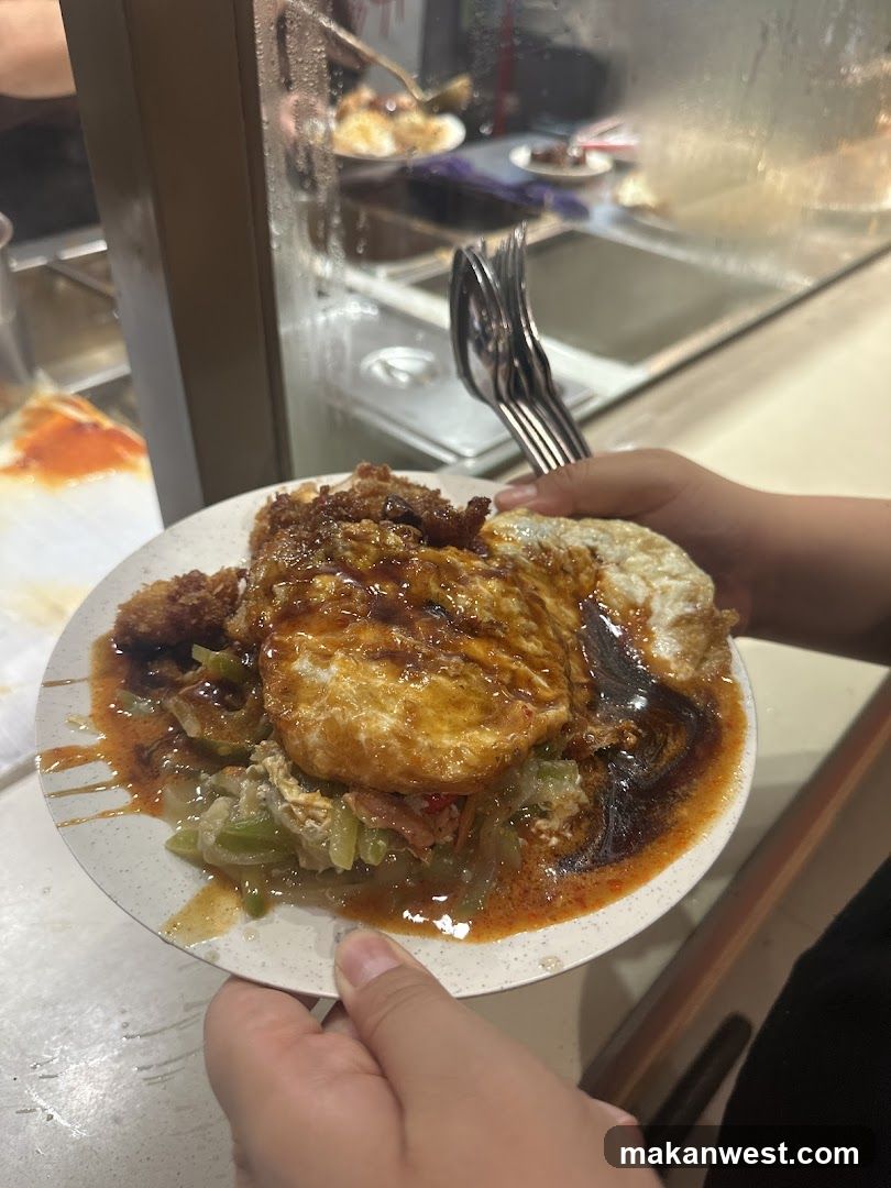 Plate of food with fried egg and sauce