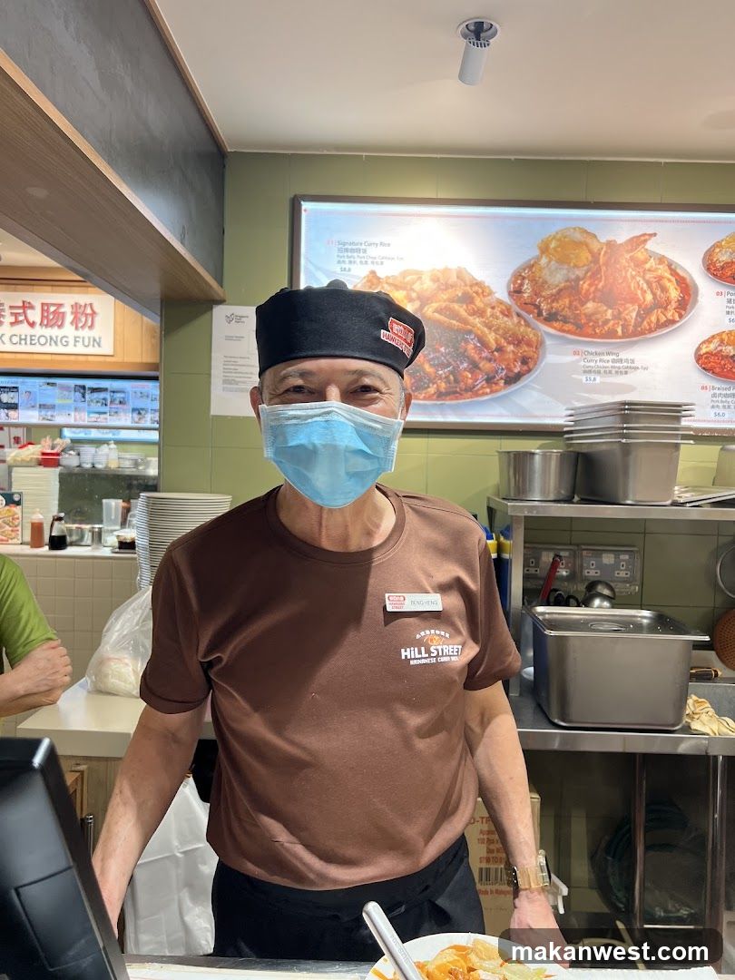 Staff Member at a Food Stall