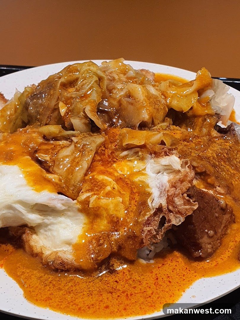 Curry Rice with Fried Egg and Cabbage