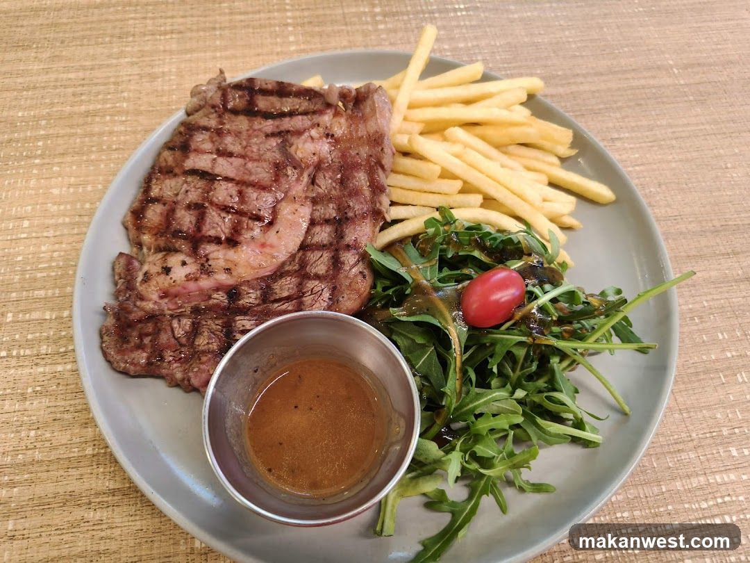 Steak with fries and salad