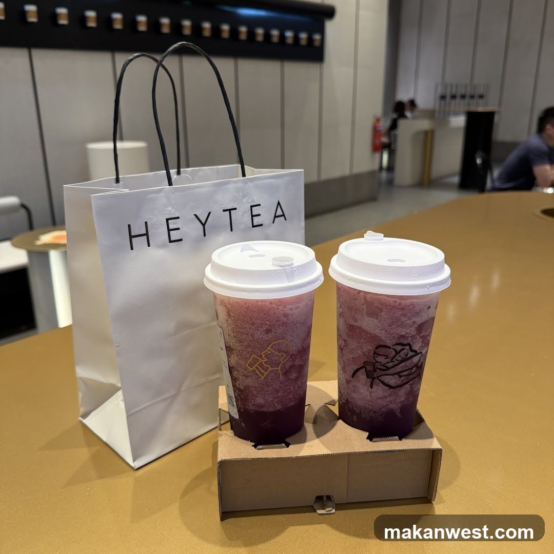Two drinks and a shopping bag