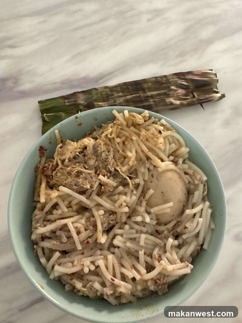 Noodle Dish with Egg and Leaf-Wrapped Item