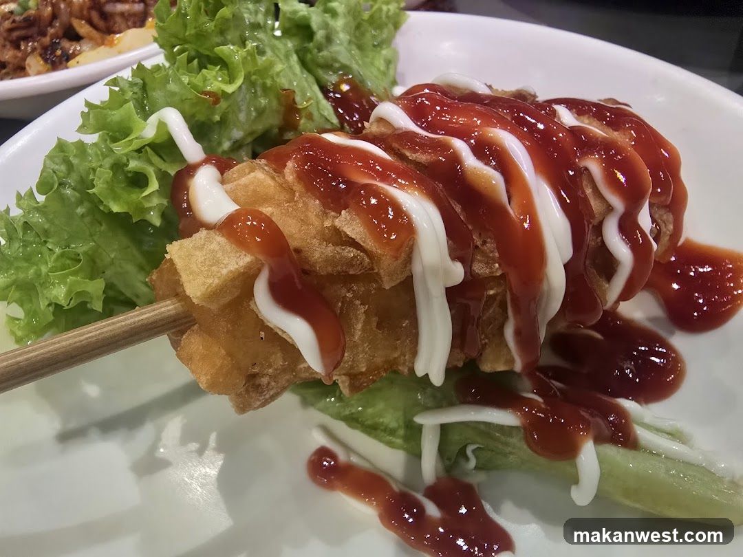 Corn Dog with Ketchup and Mayonnaise