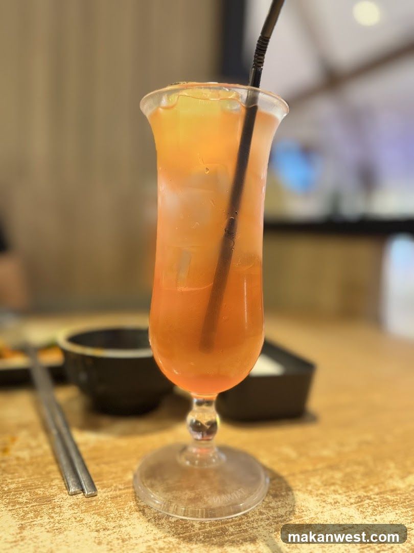Orange Drink with Straw