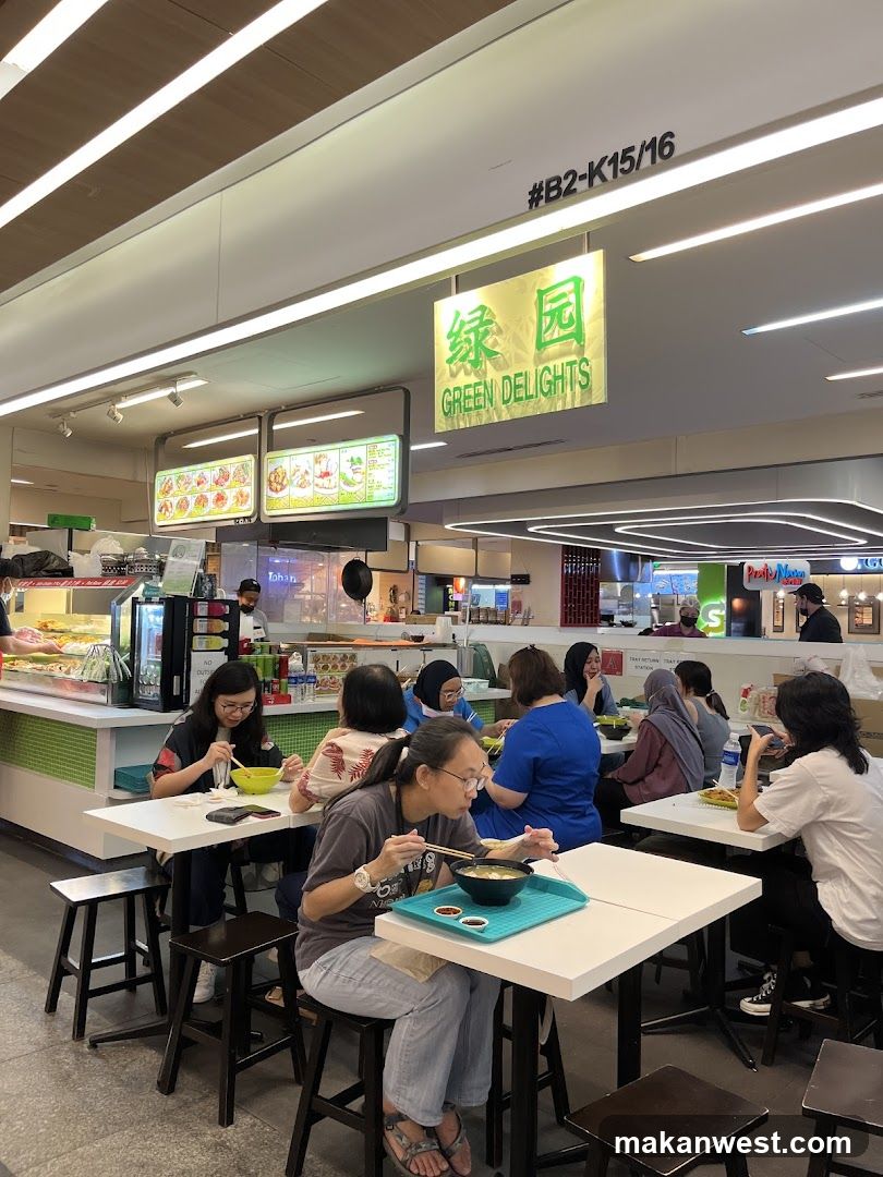 People eating at a food court