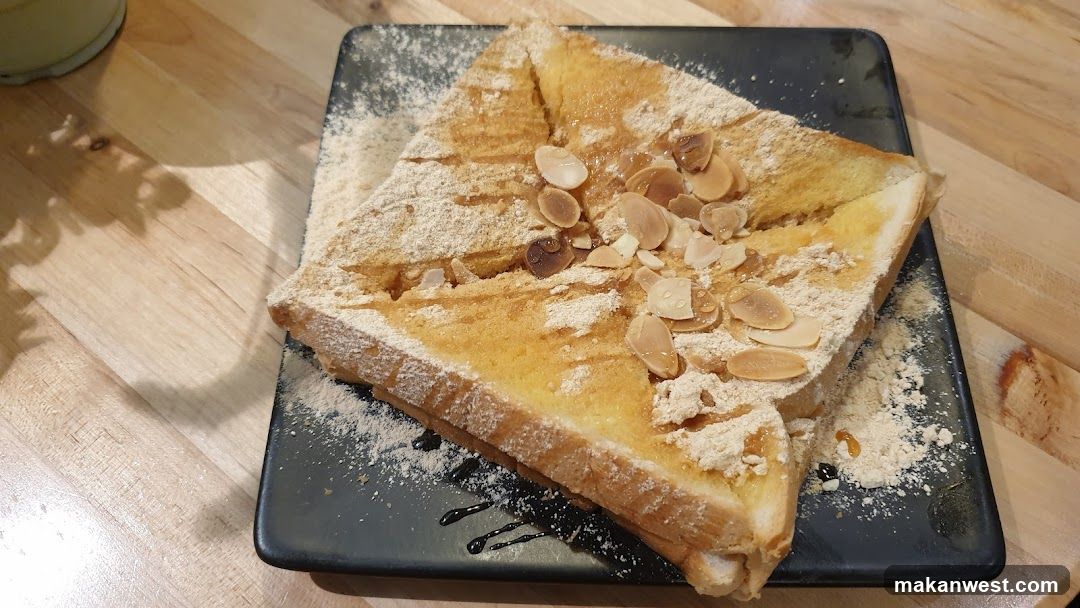 Sweet Toast with Almonds and Powdered Sugar