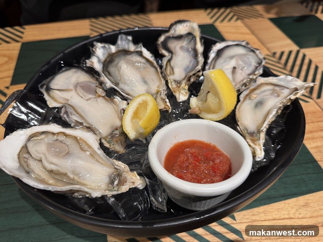 Oysters with Lemon and Sauce