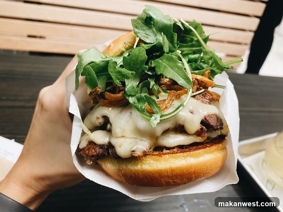 Burger with Melted Cheese and Arugula