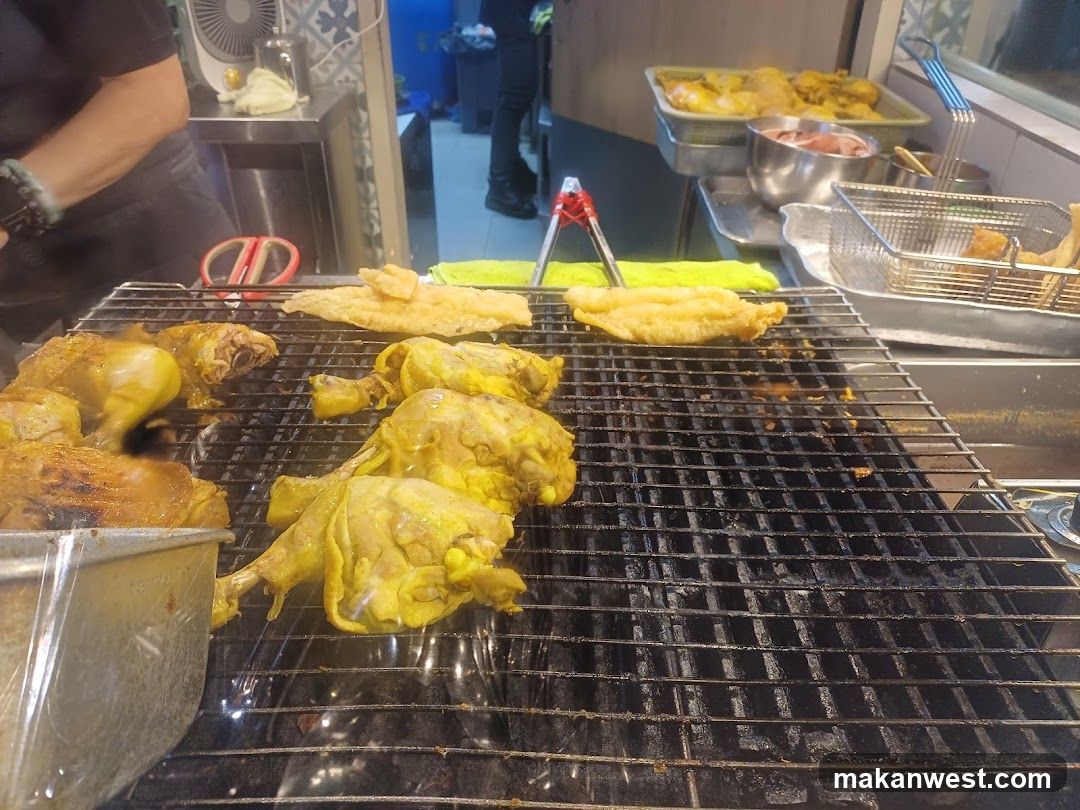 Fried Chicken and Fish on a Grill