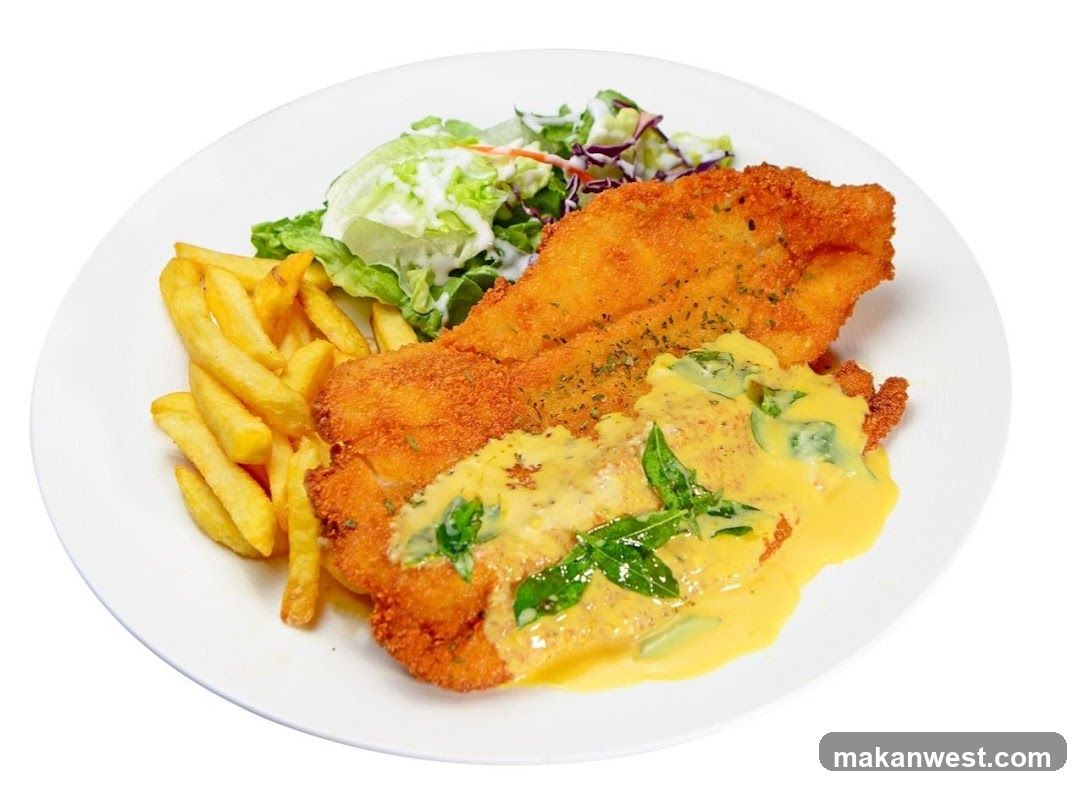 Breaded Fish with Fries and Salad