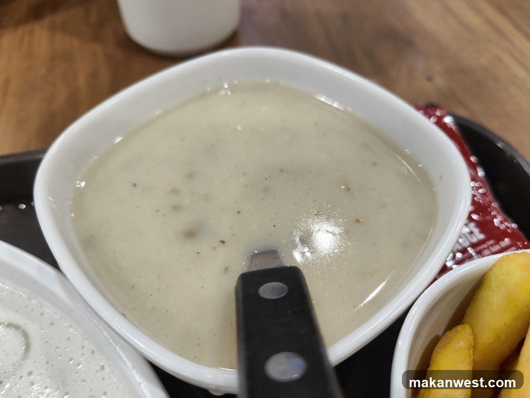 Creamy Soup with Spoon