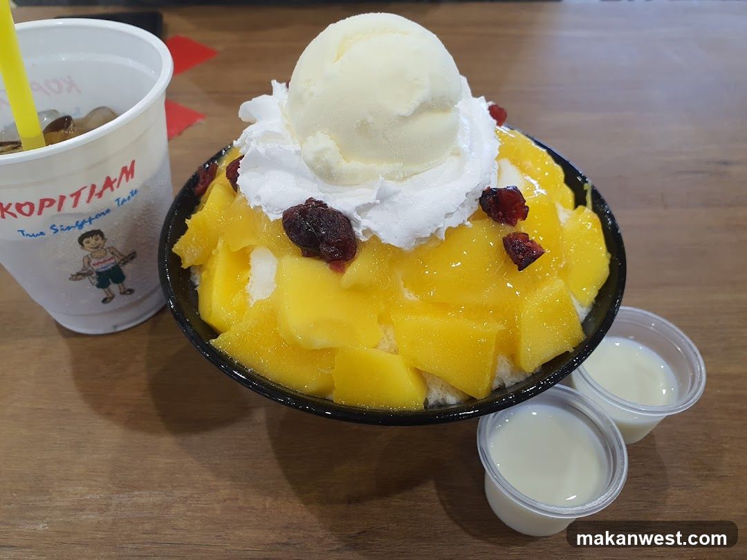 Mango shaved ice dessert with ice cream and condensed milk