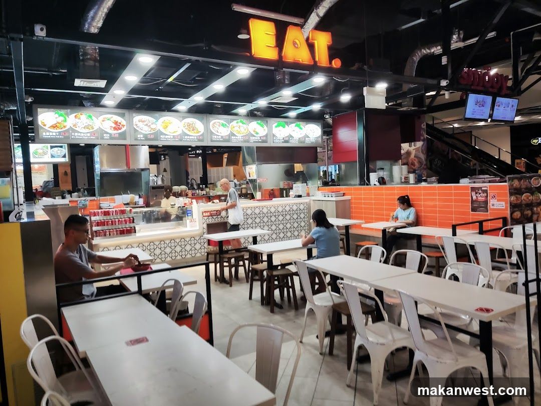 Food court with dining tables and food stalls