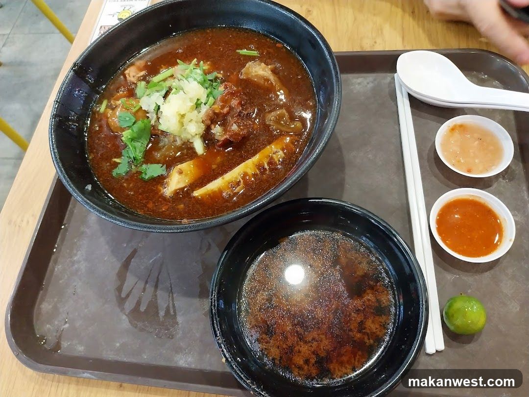 Beef noodle soup with side dishes