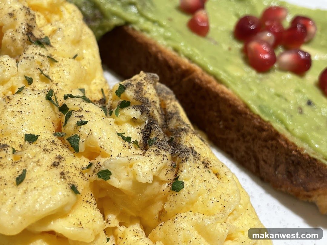 Avocado Toast with Pomegranate and Scrambled Eggs
