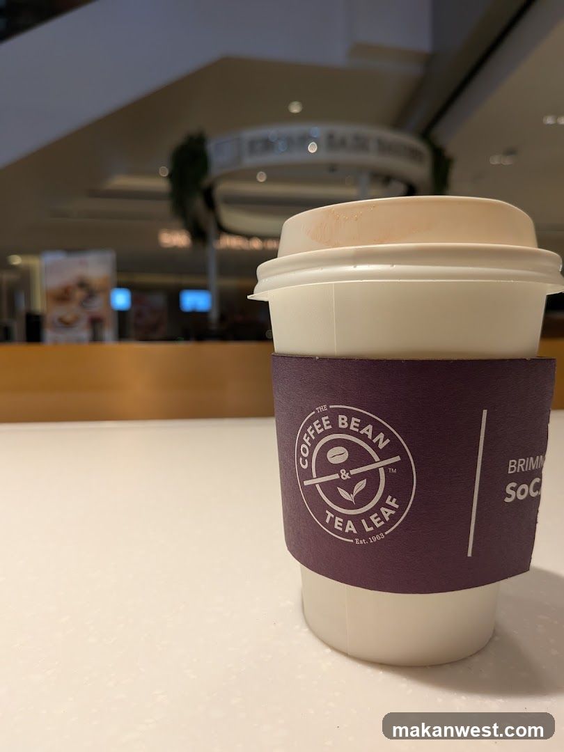 Coffee Cup in Mall Interior
