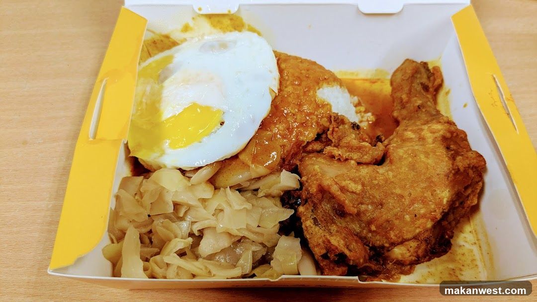 Fried Chicken Meal with Fried Egg and Pickled Vegetables