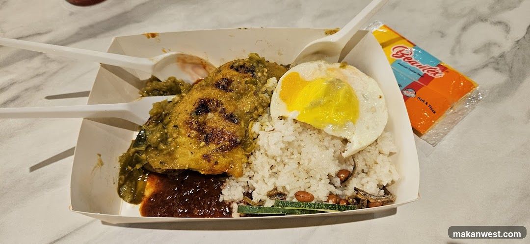 Nasi Lemak with Fried Egg and Curry Chicken