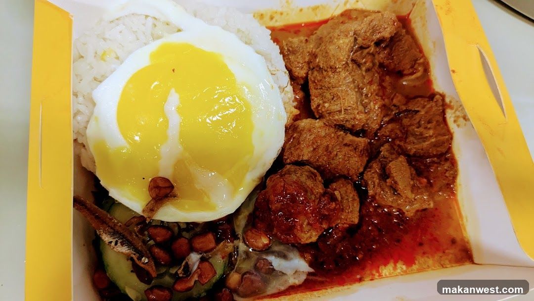 Nasi Lemak with Fried Egg and Beef Rendang