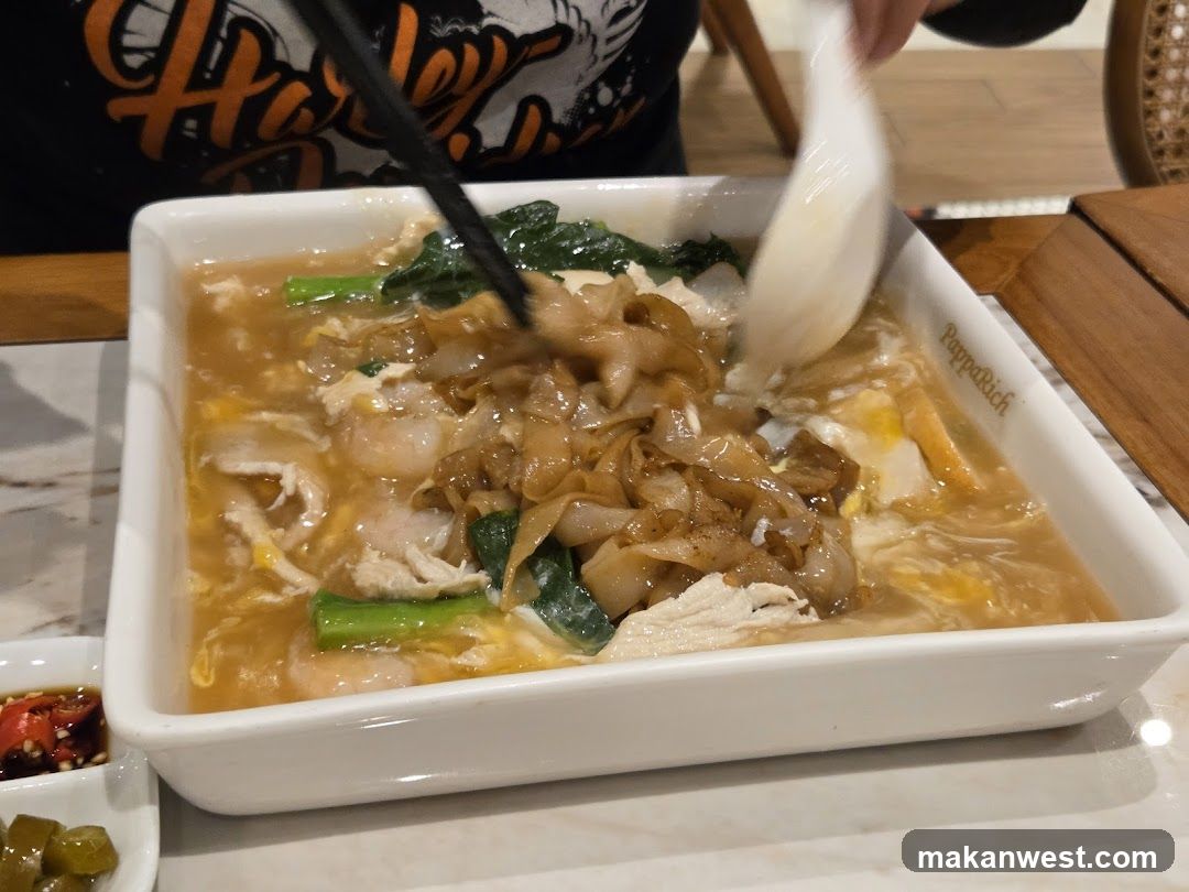 Noodle Soup with Chopsticks and Spoon