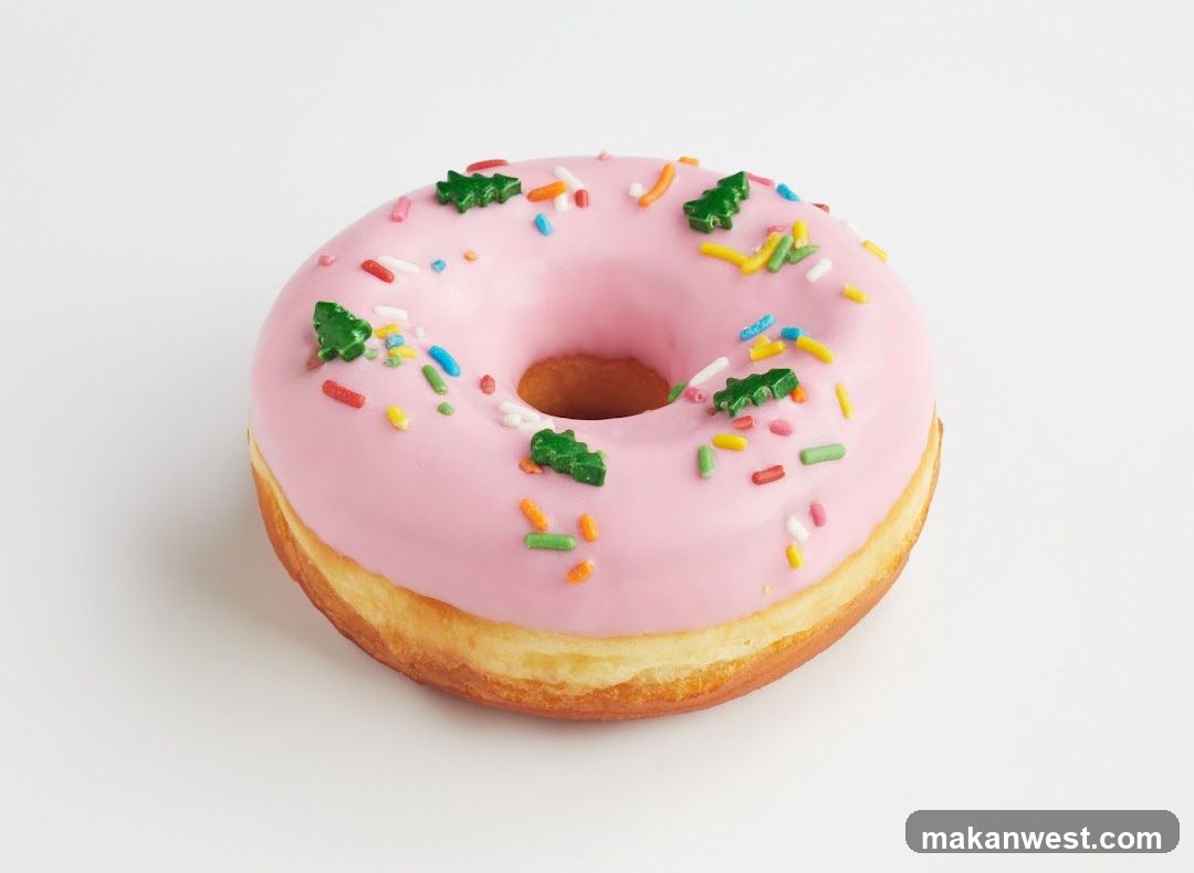 Pink Frosted Donut with Holiday Sprinkles