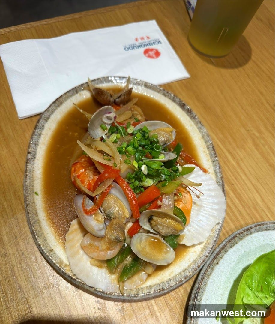 Seafood Dish with Sauce and Garnish