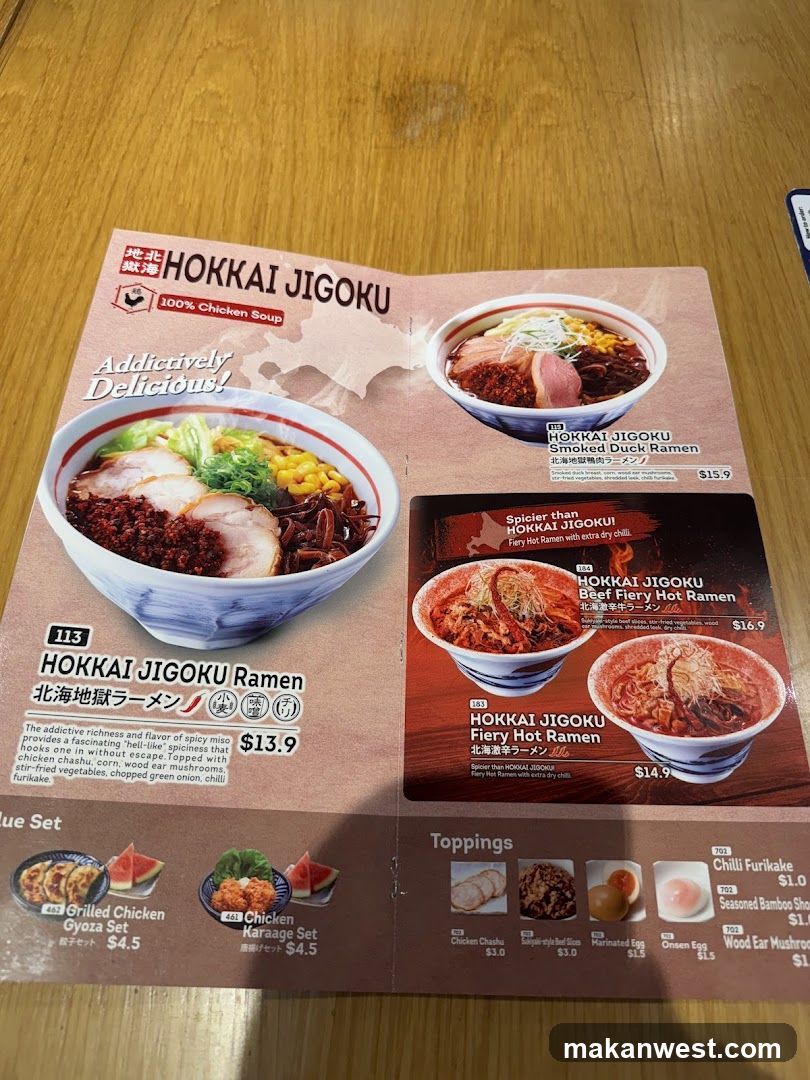 A printed menu featuring Hokkai Jigoku Ramen dishes with prices and descriptions.