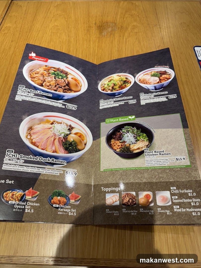 A menu showcasing various ramen dishes, including ICHI-Beef Ramen, ICHI-Chilli Butter Chicken Ramen, and Plant Based Chicken Ramen.