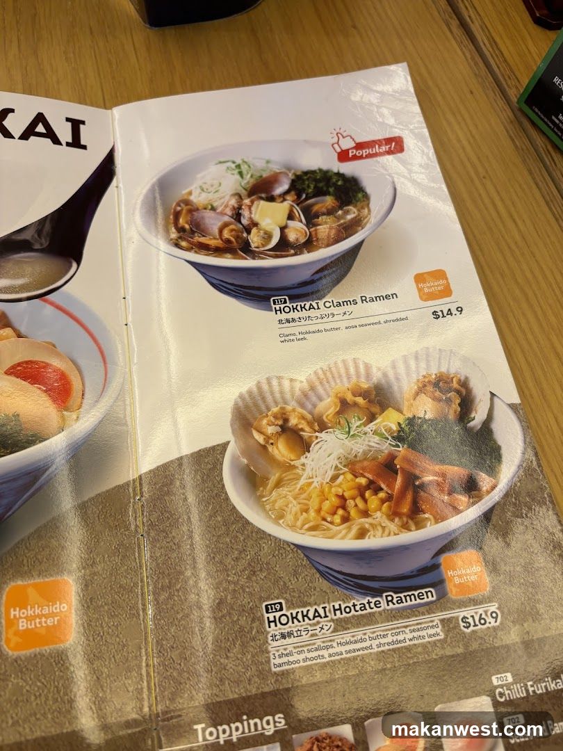 A printed menu page featuring two ramen dishes with photos, descriptions, and prices.