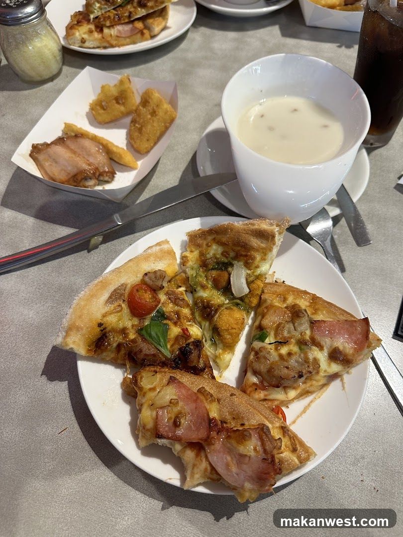 Pizza and Side Dishes at a Restaurant