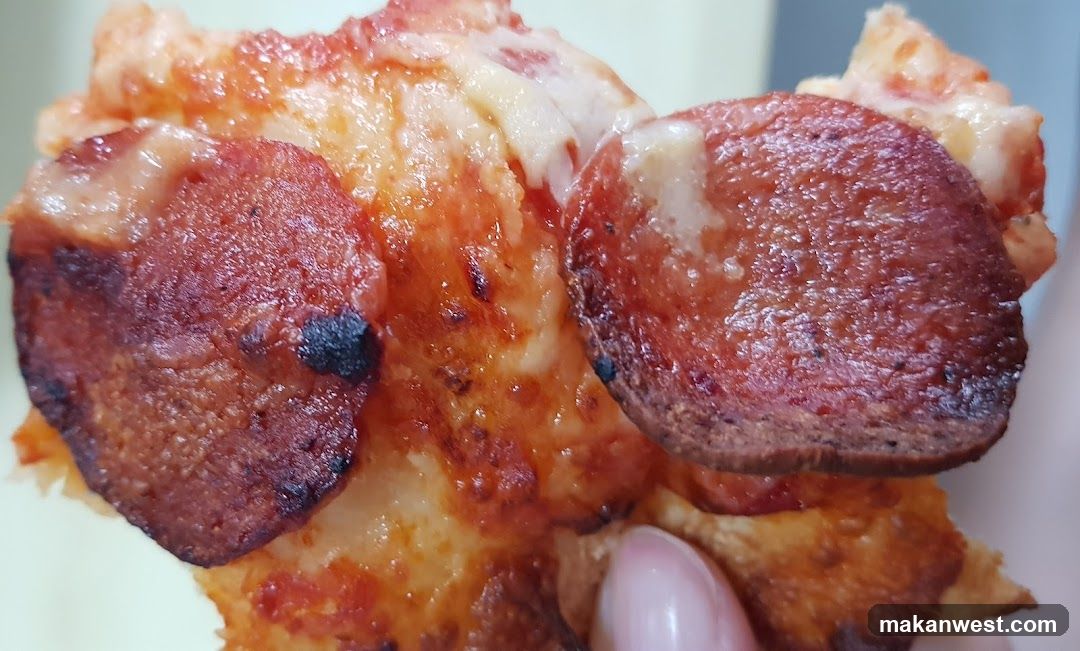 Sausage and Cheese Pizza Slice