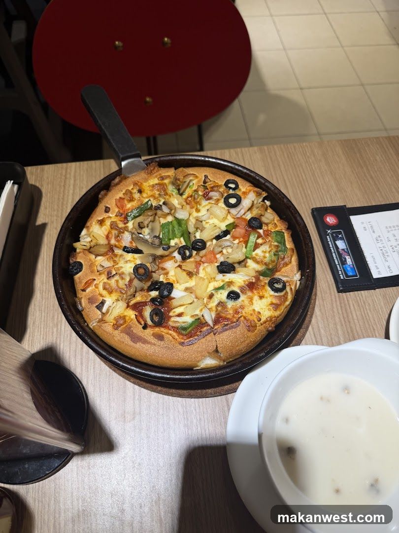 Pizza and Soup on Table
