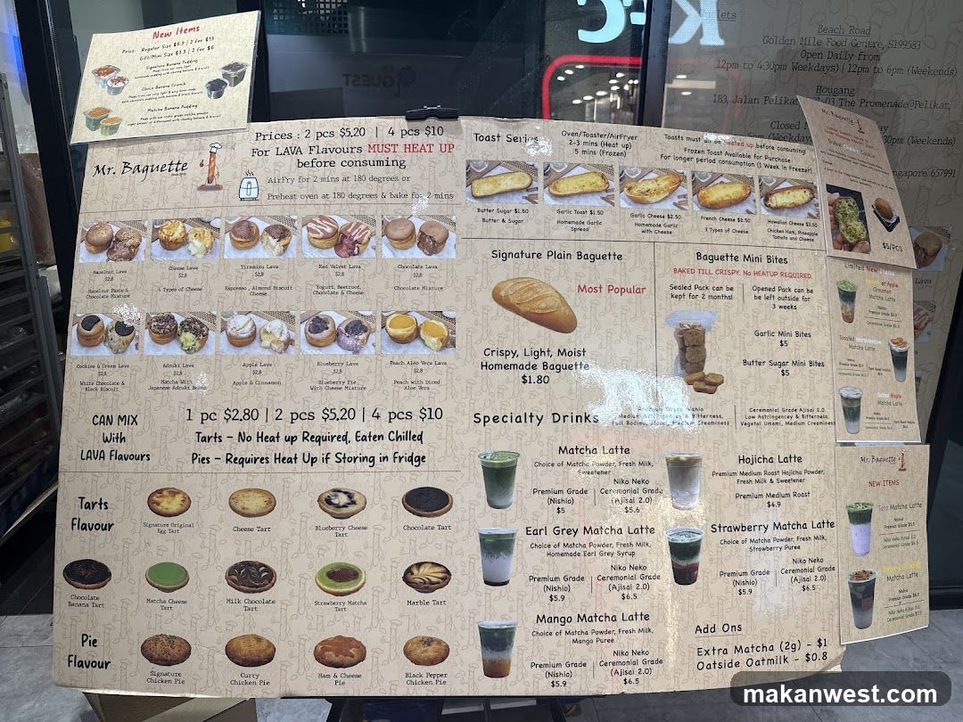 A large printed menu board displayed in a window, featuring sections for baguettes, tarts, pies, specialty drinks (Matcha Latte, Earl Grey Matcha Latte, Mango Matcha Latte, Hojicha Latte, Strawberry Matcha Latte), and add-ons like Extra Matcha and Oat Milk. Prices are listed per piece or set of pieces.