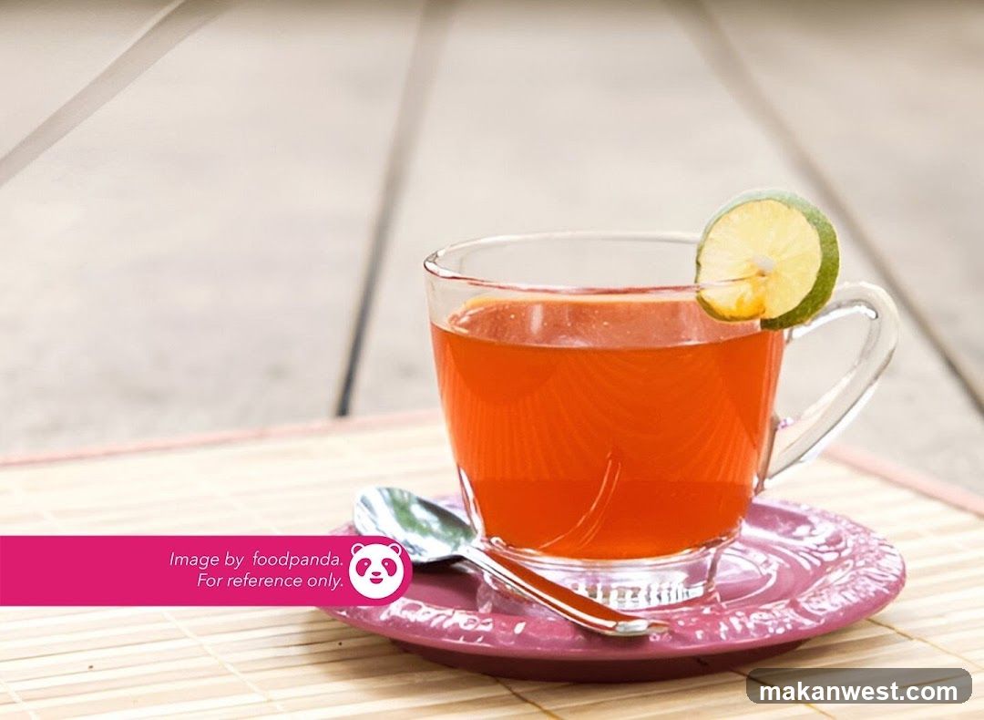 Lime Tea in Glass Cup