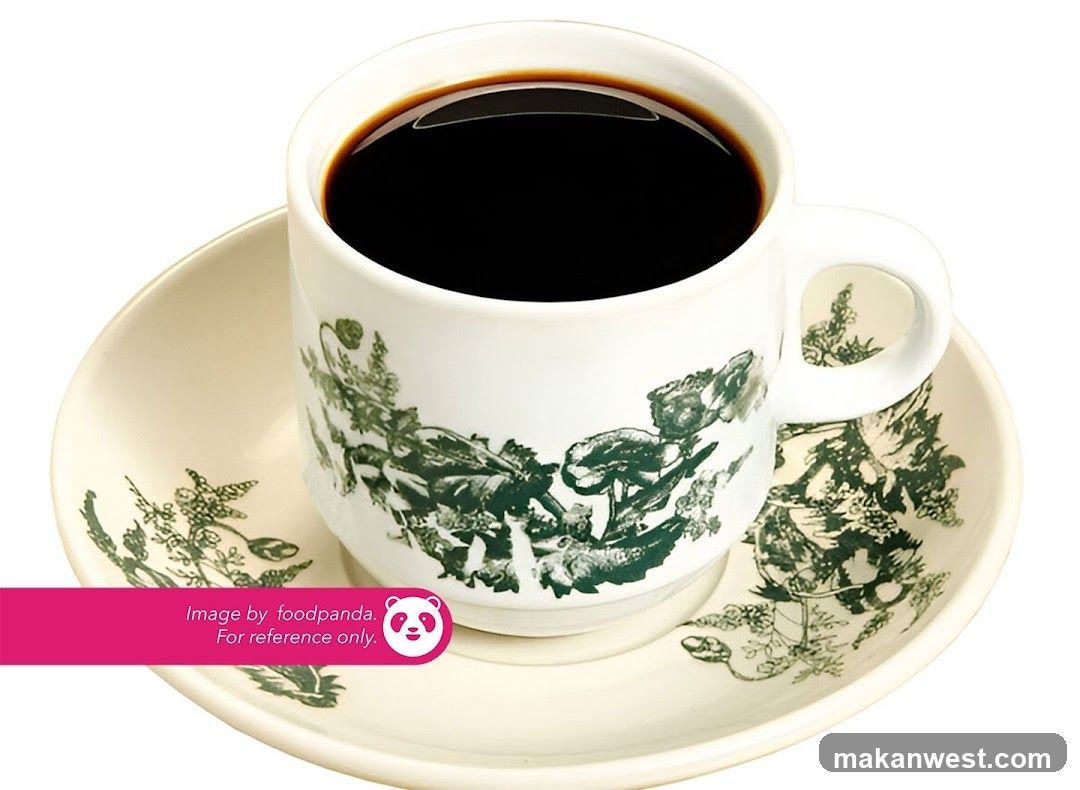 Black Coffee in Decorative Cup and Saucer