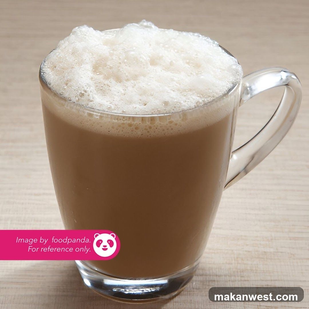 Foamy Coffee Drink in Glass Mug