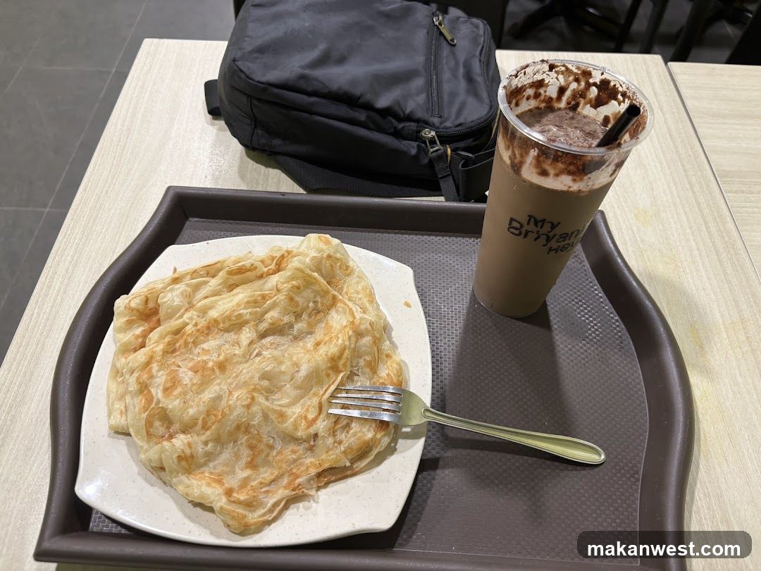 Breakfast Tray with Roti Canai and Chocolate Drink