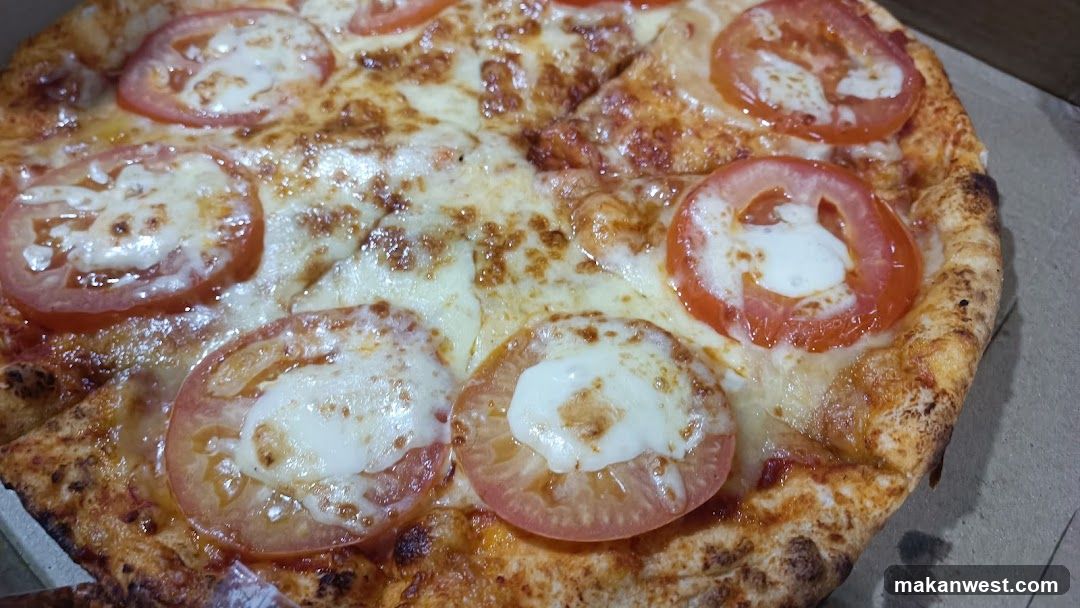 Pizza with Tomato Slices and Cheese