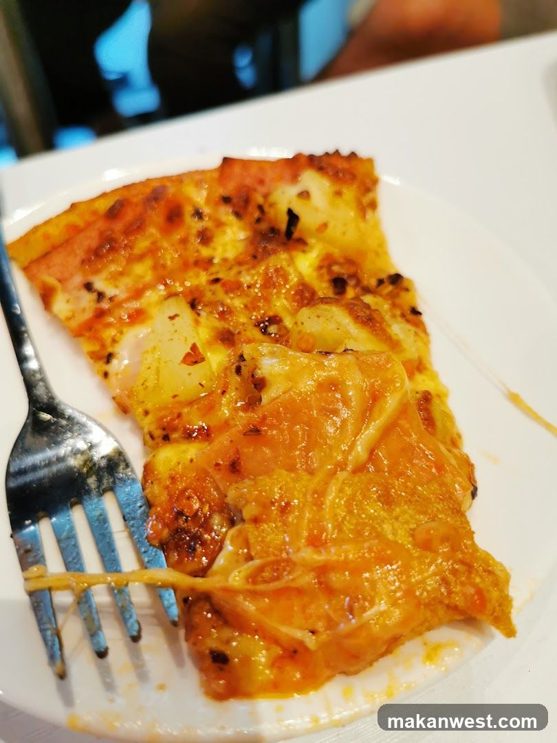 Pizza Slice on Plate